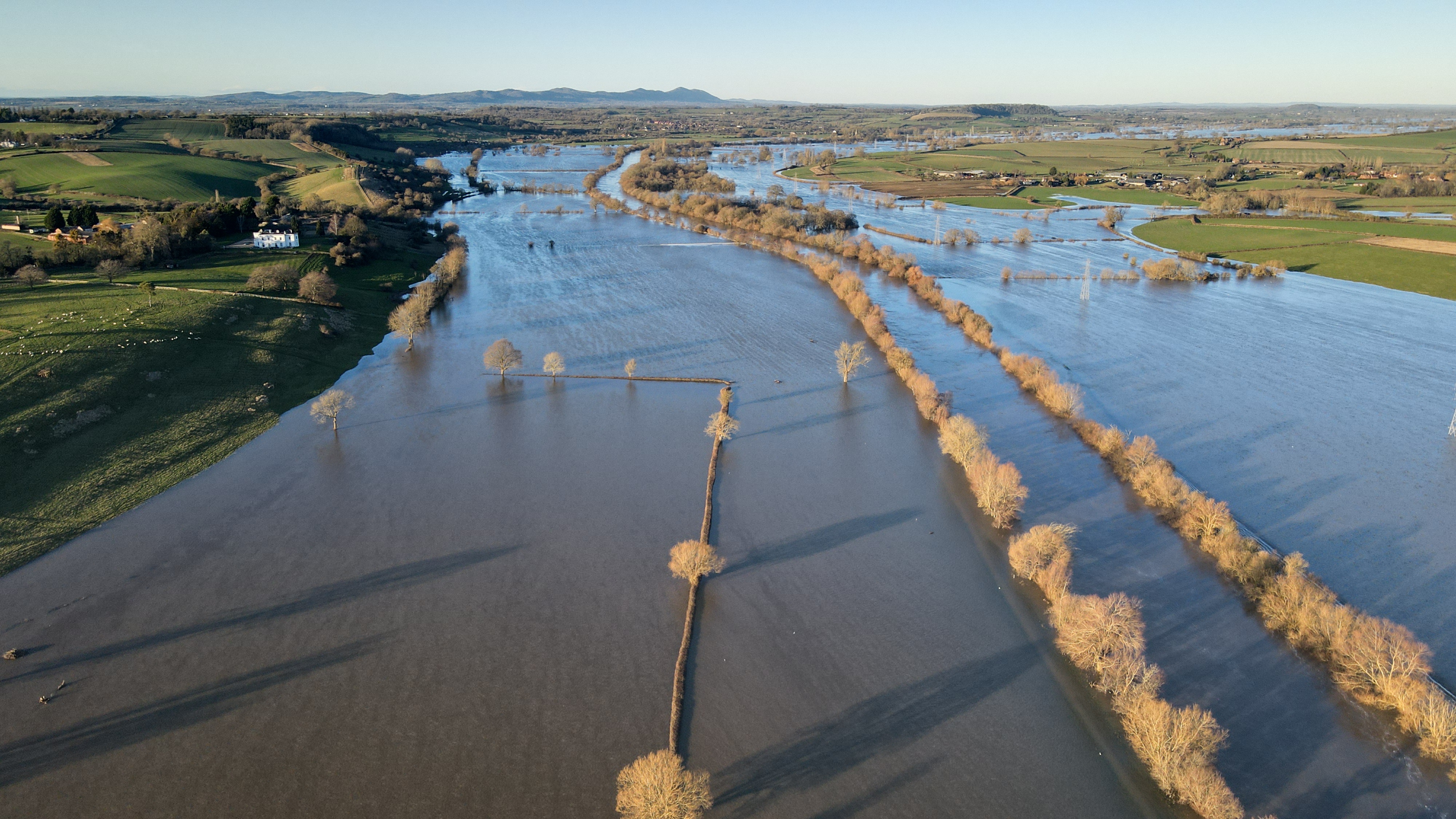 Drove view of Flooding Around Maisemore 2023 showing fields under floodwater.